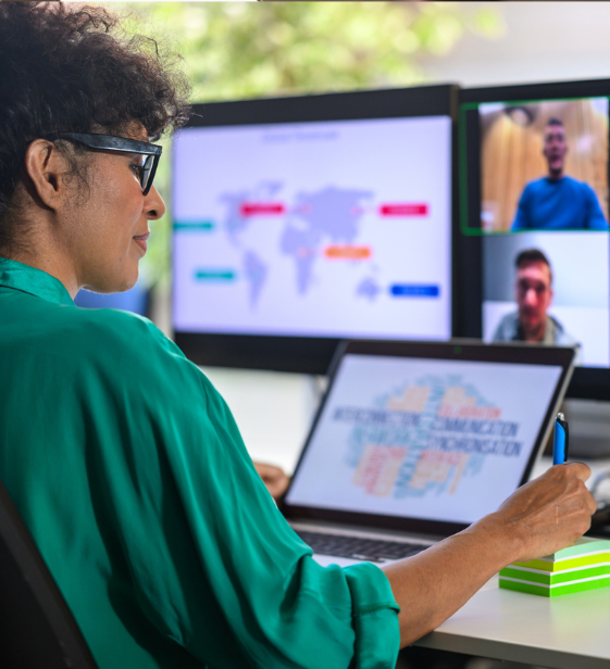 Remote employee in virtual meeting with global team, highlighting the challenge of supporting a dispersed workforce.