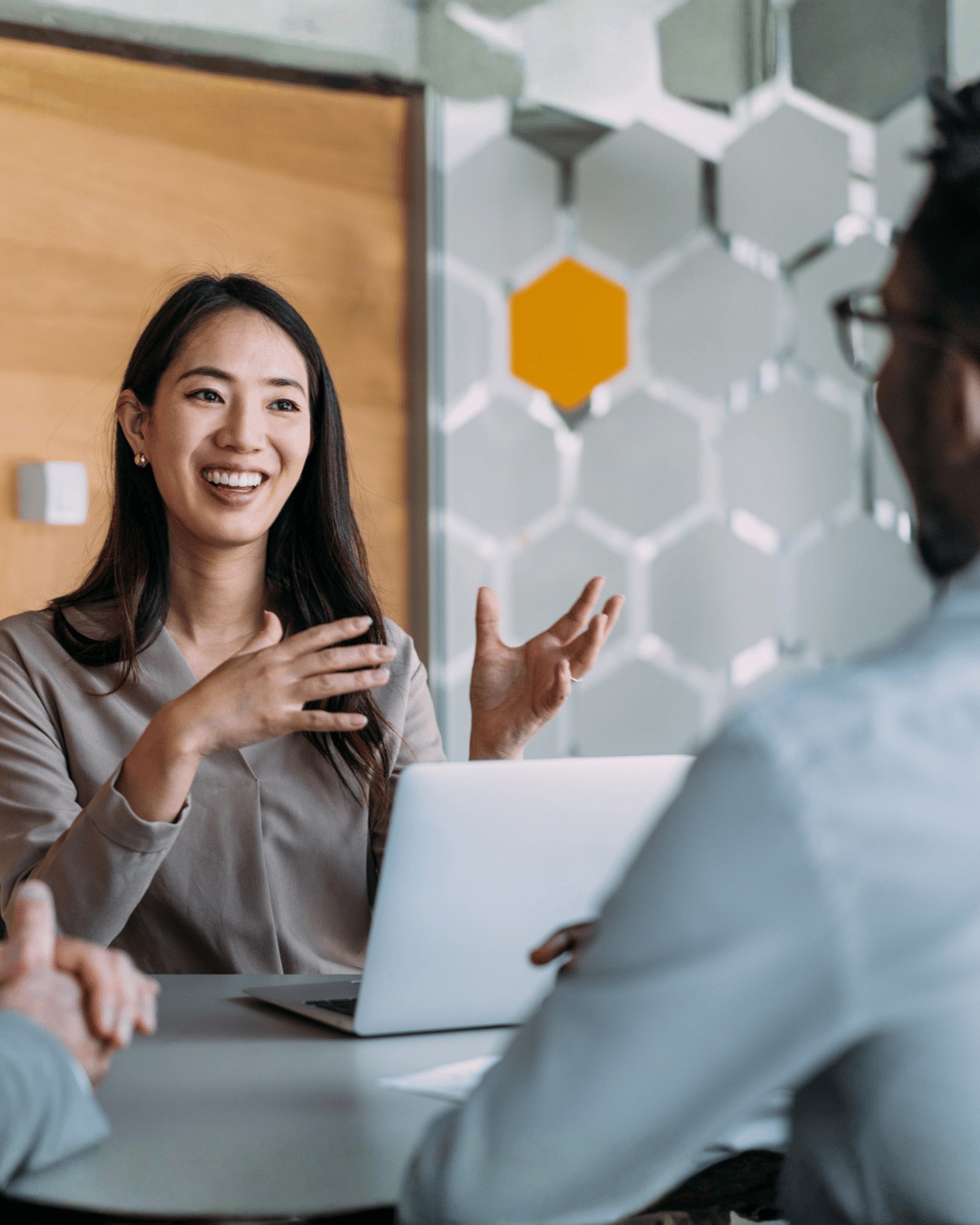 An Exos project manager coordinates with internal and external stakeholders to align on priorities and milestones.