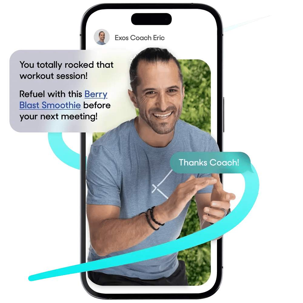 Coach Eric smiles during a video call, congratulating a client on their workout and suggesting a Berry Blast Smoothie.